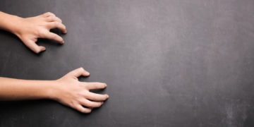Why Does The Sound Of Fingernails On Chalkboard Make Us Go Cringe?