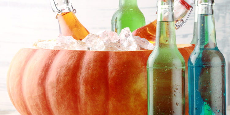 A guide to turn the pumpkin into a drink cooler for spooky Halloween Party